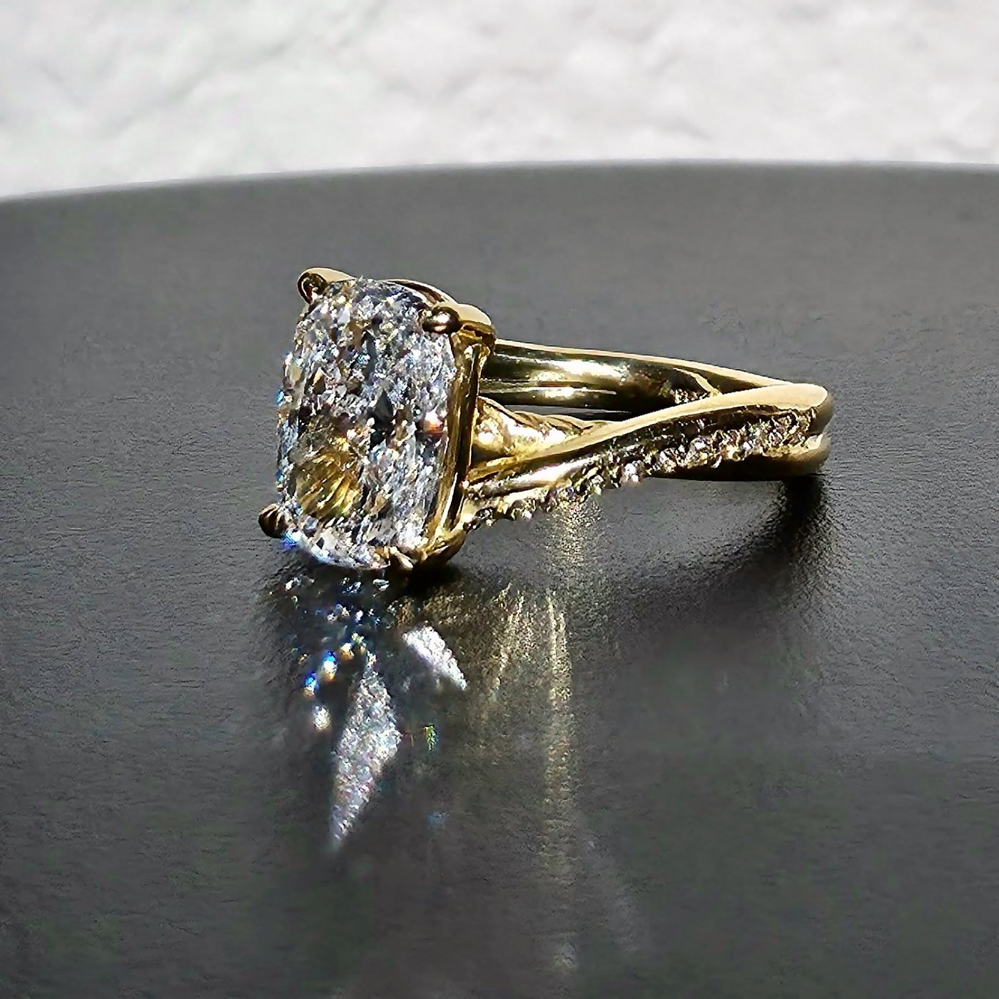 Close detail of Love Knot cushion diamond in warm gold