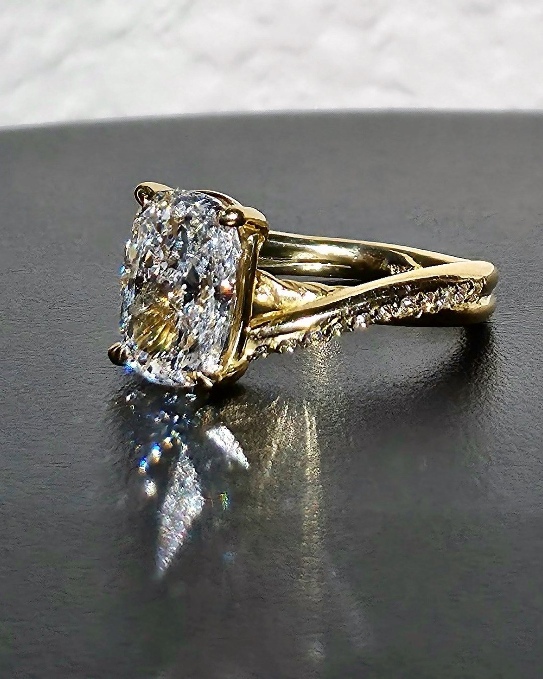 Love Knot cushion diamond ring with twisted pavé band